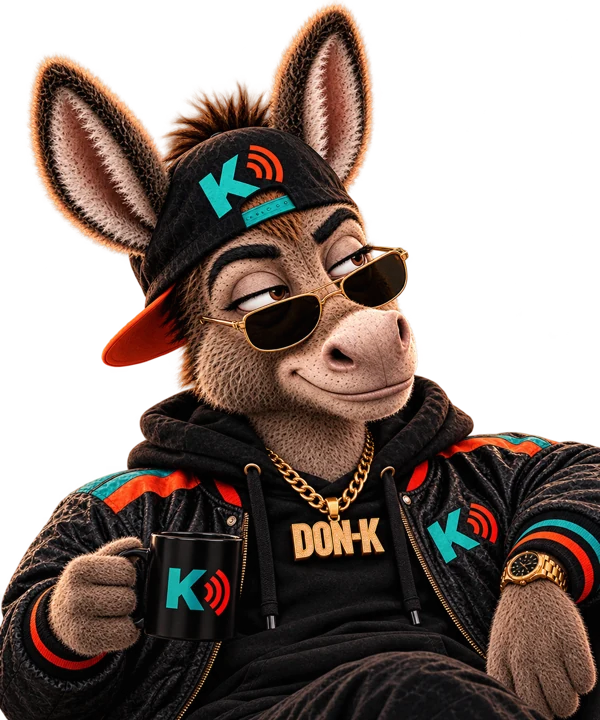 Don-K, the Kulture Kast host, giving a thumbs-up with his Kulture Kast mug